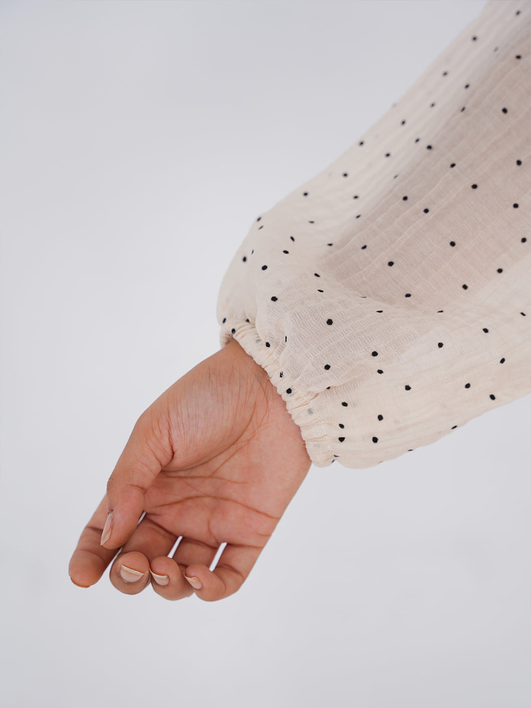 Dotted Ivory Elegance